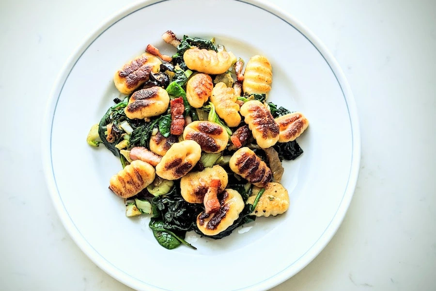 Gnocchi with Bacon and Sautéed Greens image